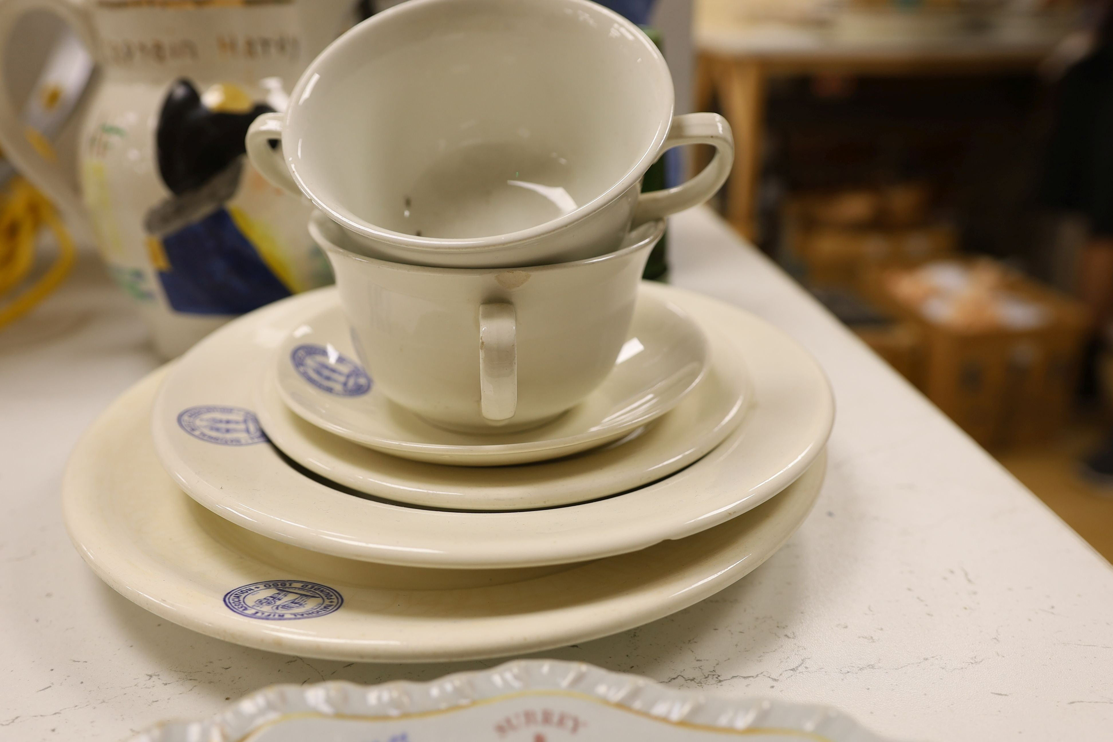 A collection of National Rifle Association ceramics.